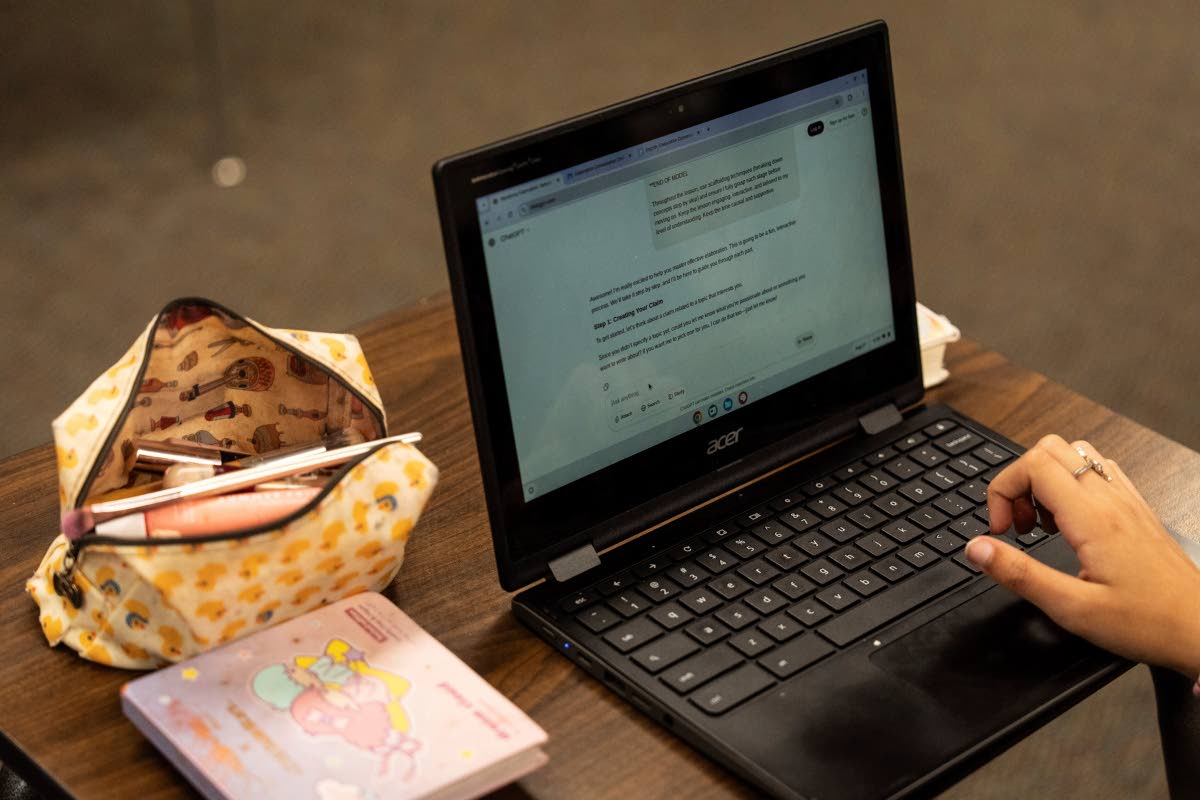 A student types a prompt into ChatGPT on a Chromebook during class on August 27, 2025.