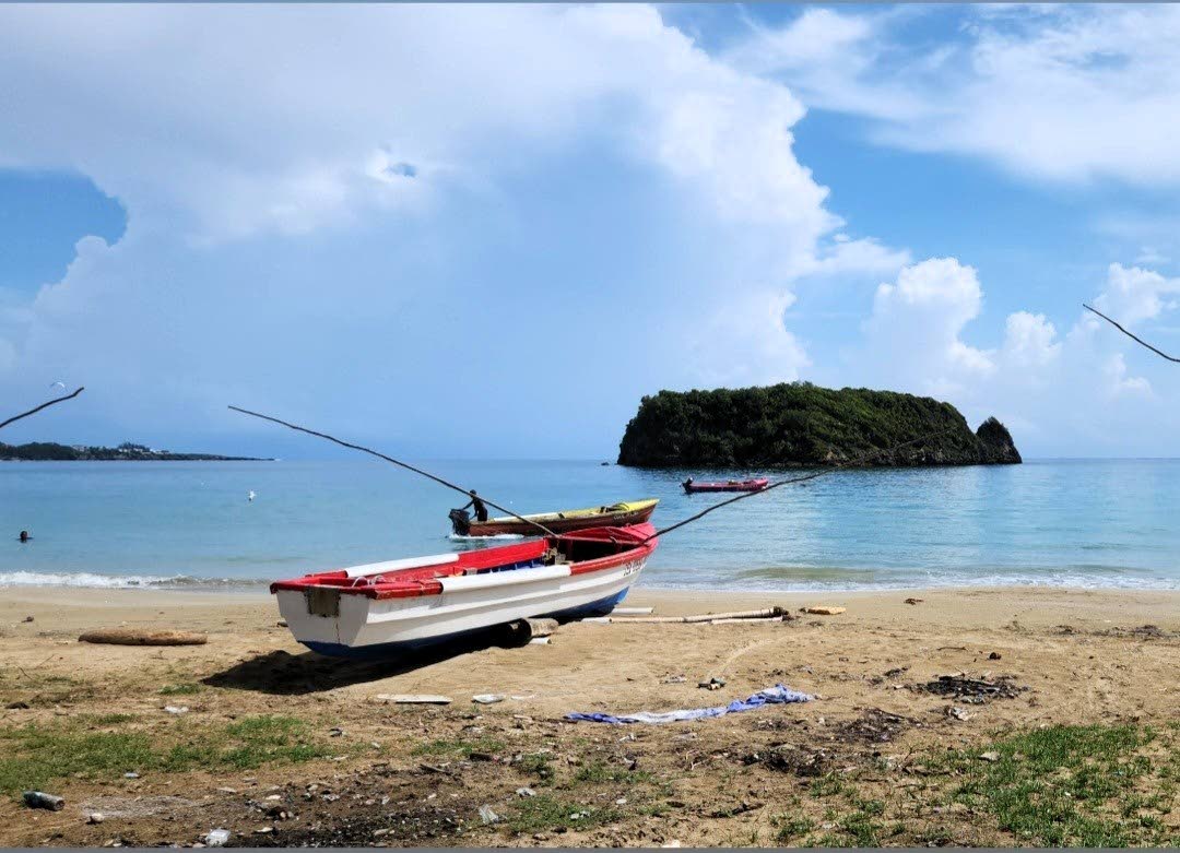PHOTO BY Dave Sewell 
Tranquillity – photo taken at Pagee Fishing Beach, Port Maria