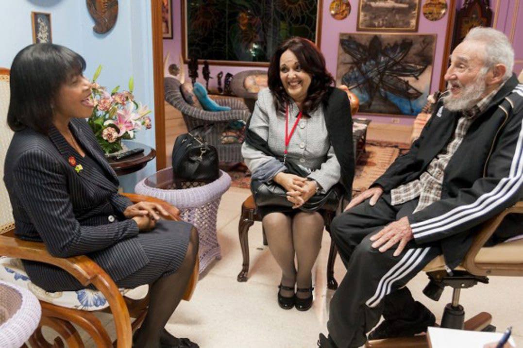 Jamaica’s Prime Minister Portia Simpson Miller (left) visits with Cuba’s former President Fidel Castro in Havana, Cuba, on Monday, January 27, 2014, on a trip to the island to attend the Community of Latin American and Caribbean States summit.