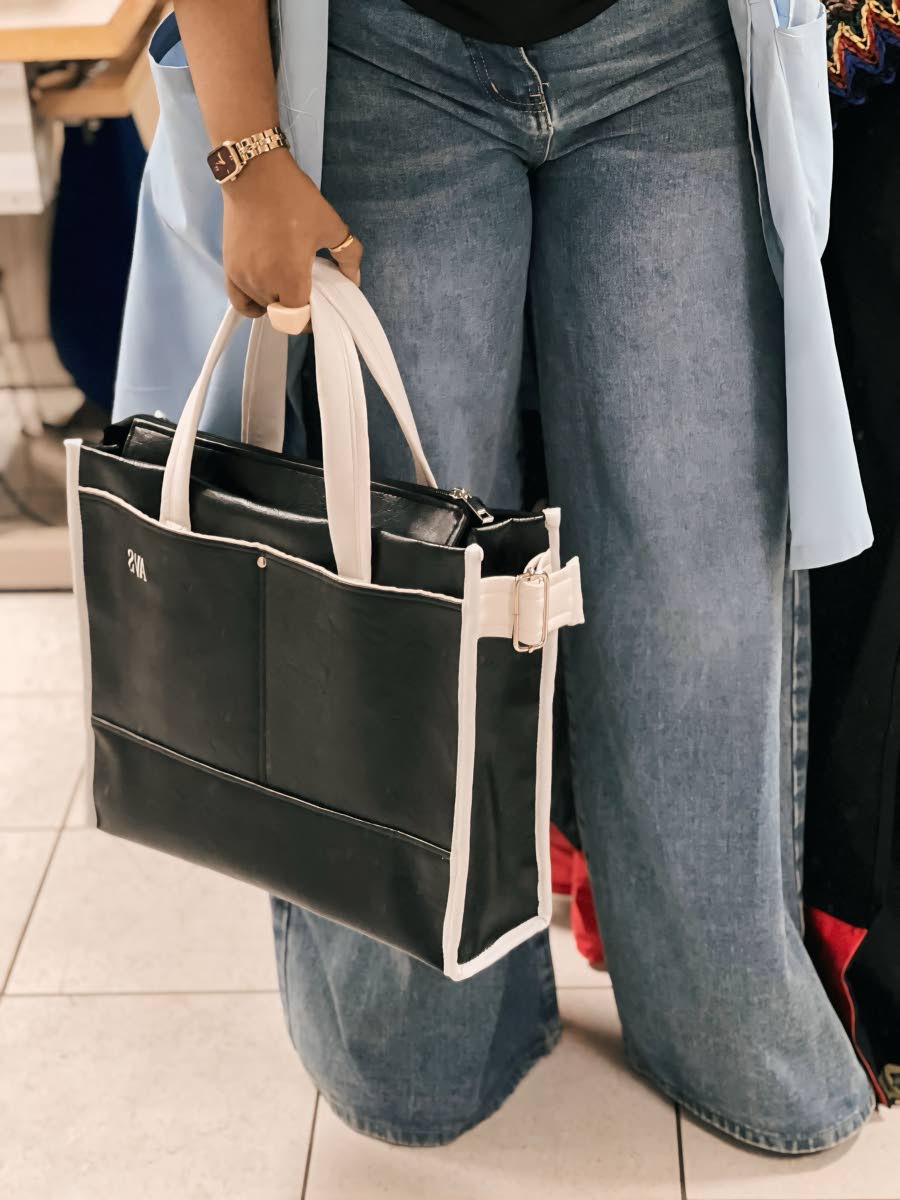 Melissa Moses Designs’ tote collection blends classic black-and-white hues with timeless elegance.