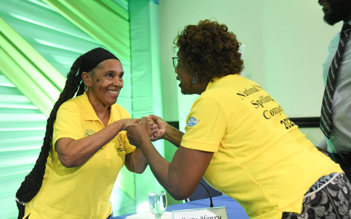 Beverly Been (right) congratulating her opponent, second-place winner Carey Henry, on a job well done. 