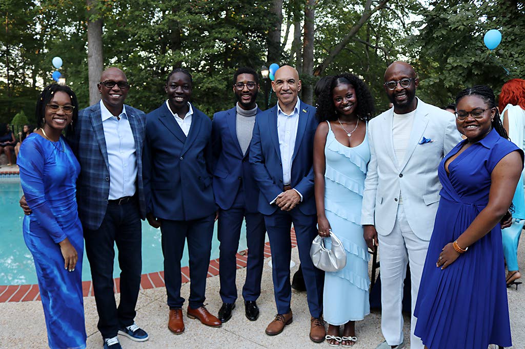 Jamaica’s Ambassador to the United States, Major General (Ret’d) Antony Anderson (centre),  Chairman of the Jamaica Howard University Affinity Network (JHUAN), Don Christian (second left)  and  board member  Michael McPherson (second right) share in a 