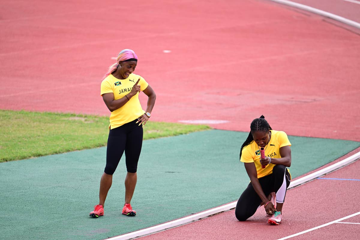 Shelly-Ann Fraser-Pryce gives sage words of advice to Jonielle Smith ahead of the women’s 4x100-metre relays at the World Athletics Championships in Tokyo, Japan. 