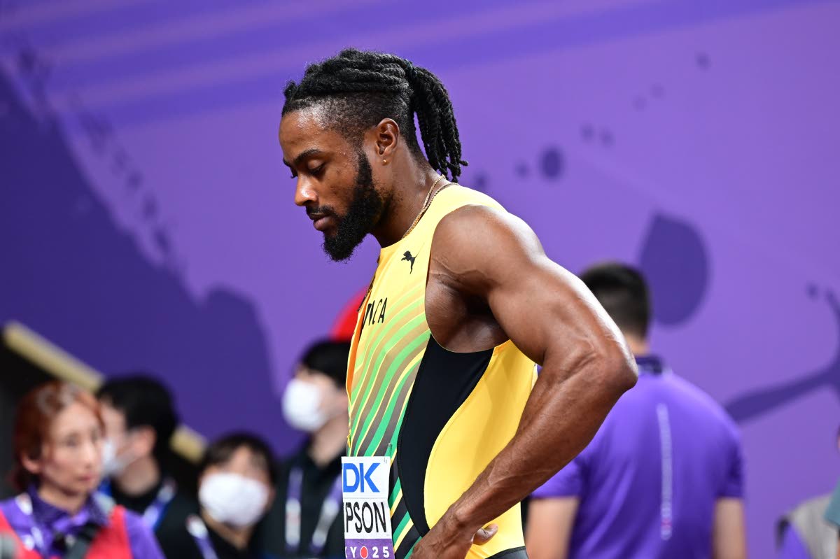 Jamaica’s Kishane Thompson, world 100-metre silver medallist, cuts a dejected figure after his 4x100-metre team failed to finish their heat from a promising position.