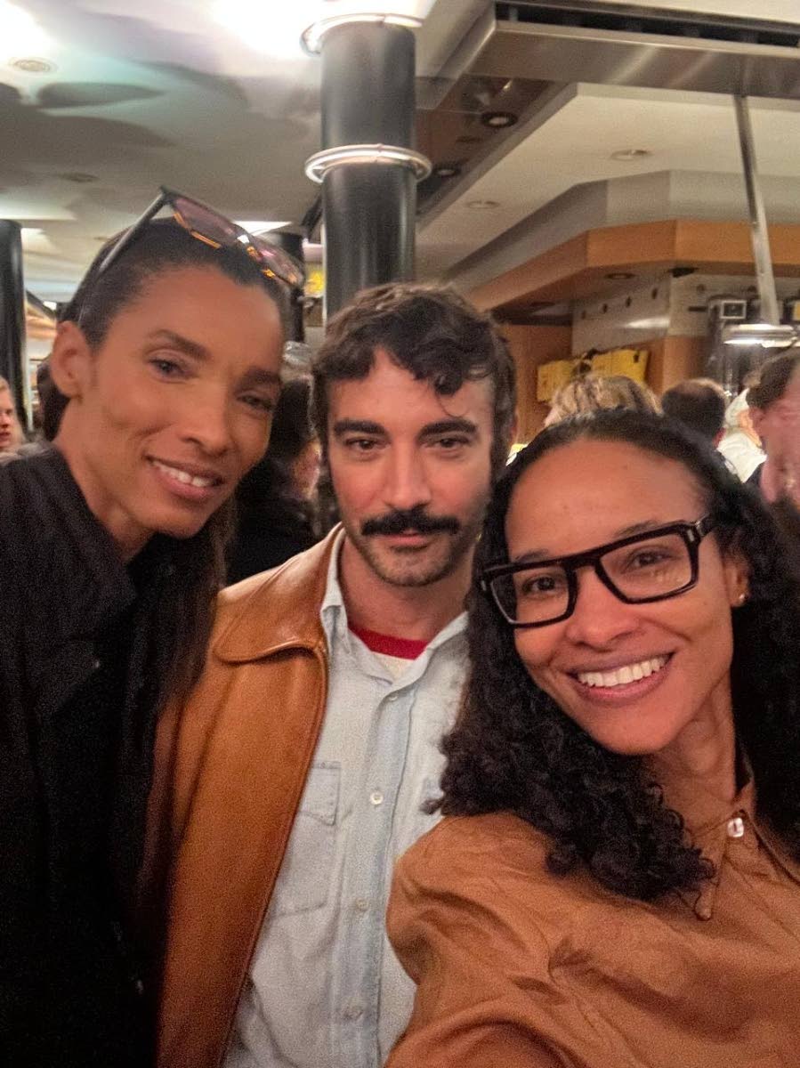 Dario Vitale (centre), creative director, Versace, with Romae Gordon (left) and Deeg Gordon, at the Versace post-show soirée at famed Milanese restaurant Peck.