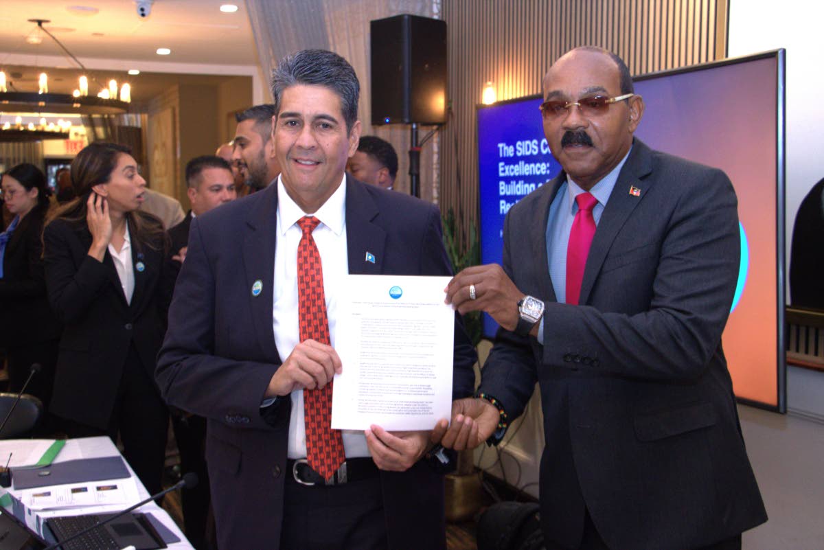 Palau’s President Surangel Whipps Jr (left) and Antigua and Barbuda’s Prime Minister Gaston Browne show off the Declaration.