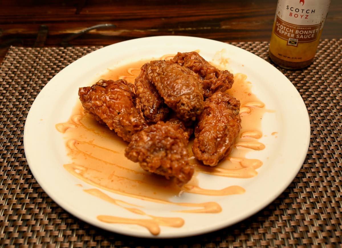 The honey Scotch wings are glazed with local honey and Scotch Boyz’s Scotch bonnet sauce.