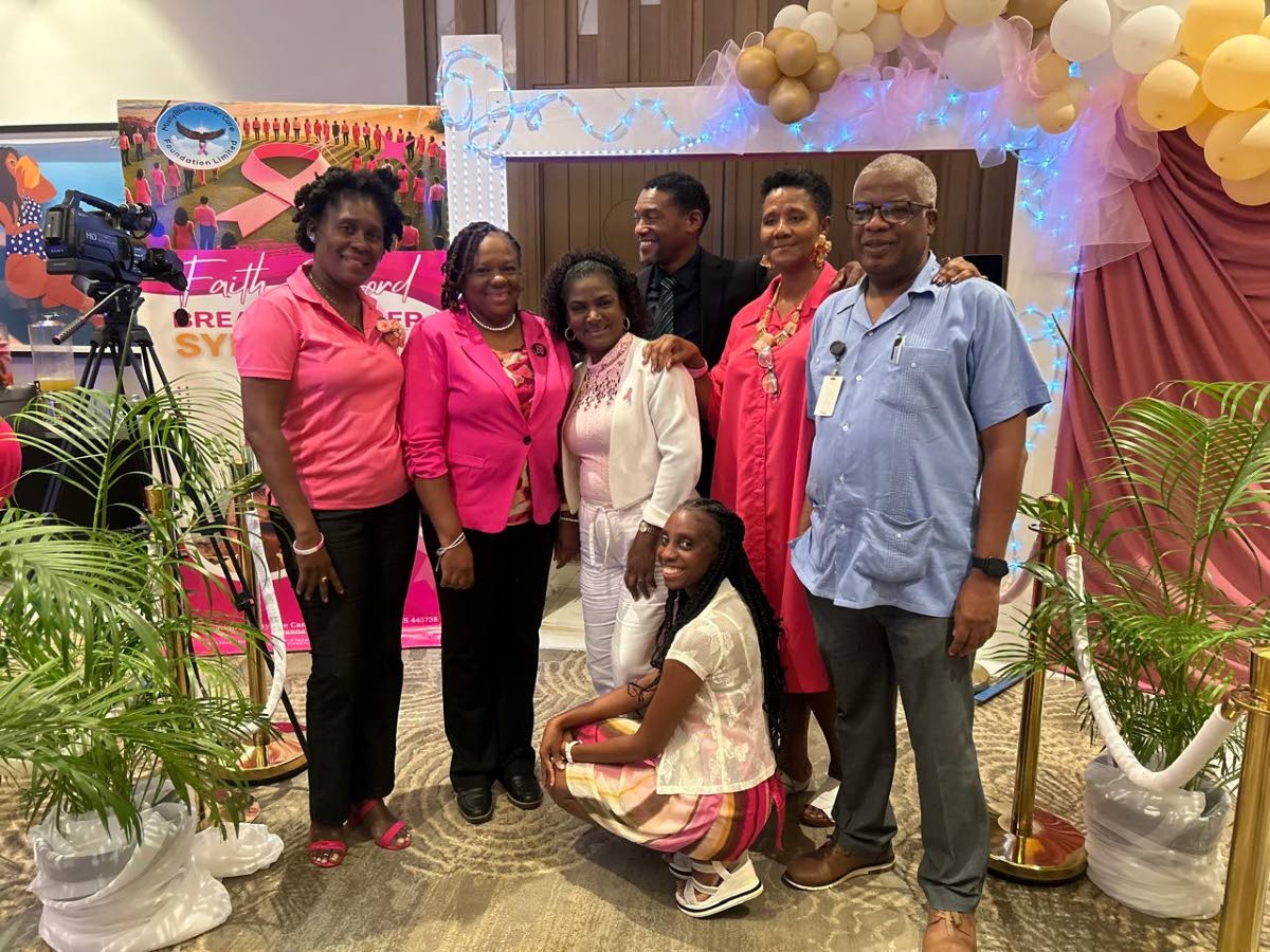 The family of Faith Gifford (from left) son Christopher Spence; daughter-in-law Petrena Spence; grandson Christopher Spence Jr; sister-in-law Hyacinth McFayden; husband Kelvin Gifford; and sister Kay Irving.