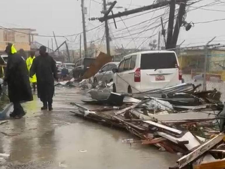 Police personnel at the Black River Police Station in St Elizabeth assessing the damage to the station during the passage of Hurricane Melissa.