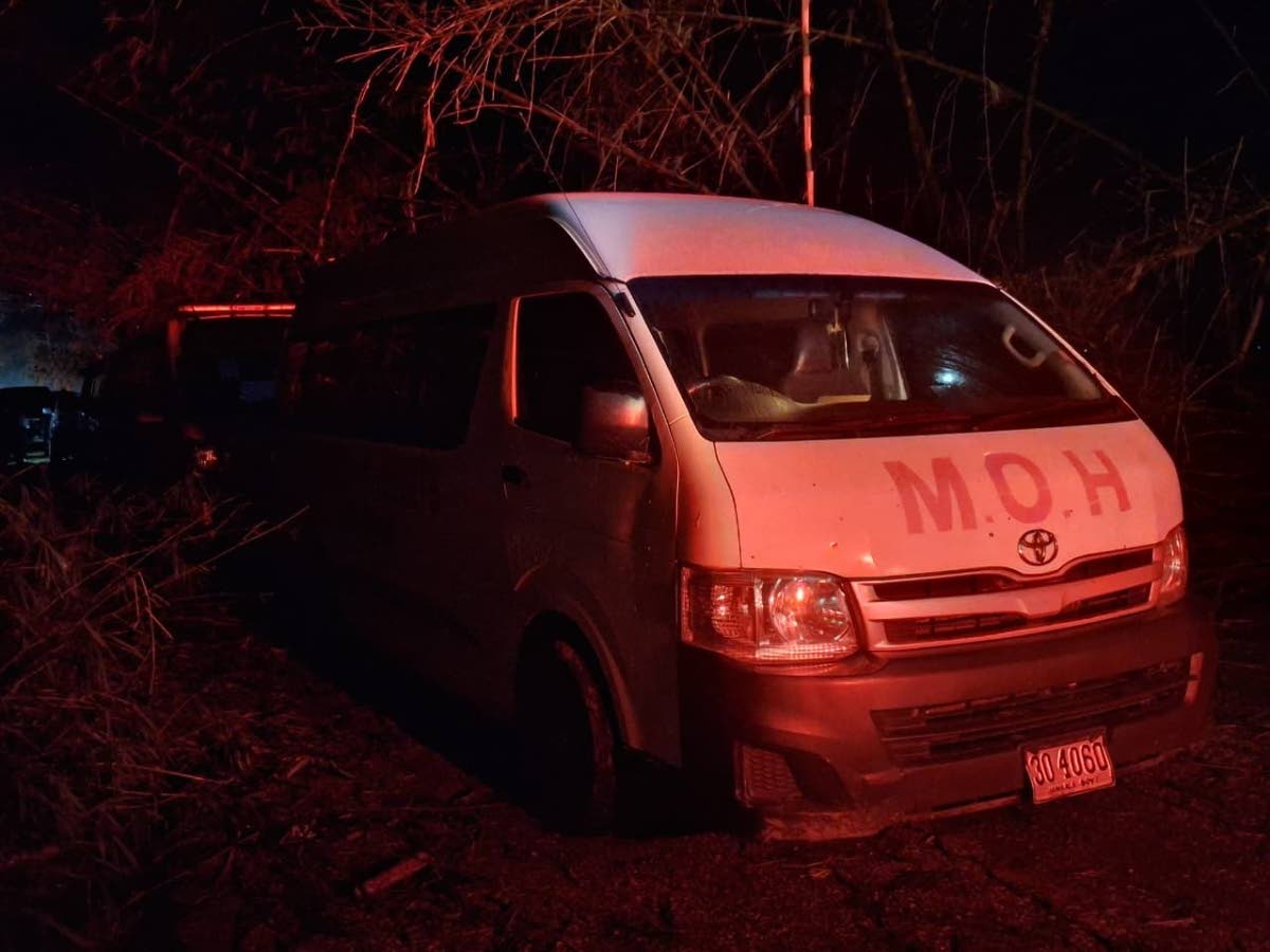 One of about 14 ambulances seen stuck in traffic along Bamboo Avenue by the Gleaner team on Wednesday night as the popular Holland Bamboo stretch remained blocked by fallen plants.