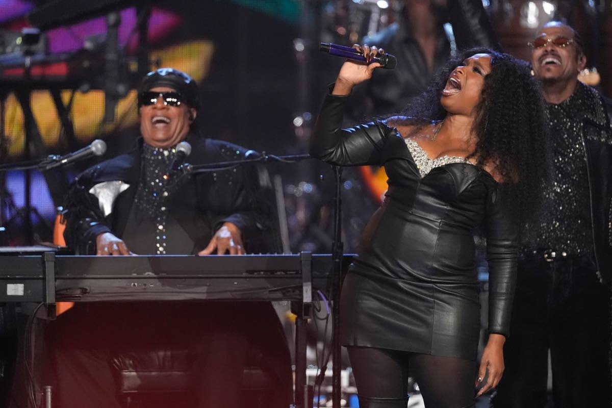 From left: Stevie Wonder, Jennifer Hudson and Maxwell perform during the 2025 Rock and Roll Hall of Fame induction ceremony.