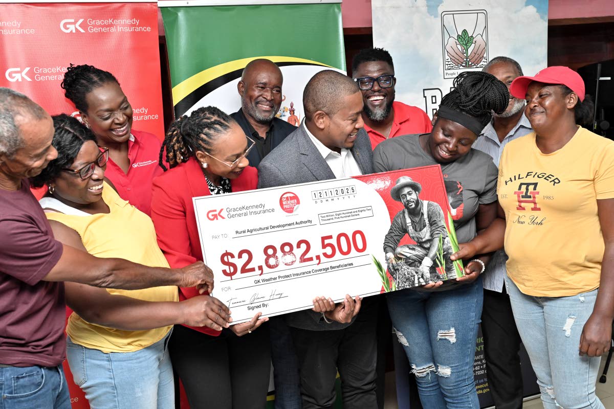 Tammara Glaves-Hucey (fourth left), head of GK General Insurance; Andrea Muir-Gibbs (third left), assistant general manager of client and partner services; and Orette Duncan (fourth right), client and partner services manager of GK General Insurance, prese