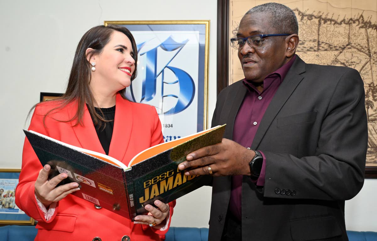 Anthony Smith presenting a copy of the ‘Best of Jamaica’ book to Angie Martinez, ambassador of the Dominican Republic to Jamaica, during a courtesy call at The Gleaner’s North Street, Kingston offices on October 4, 2024.  