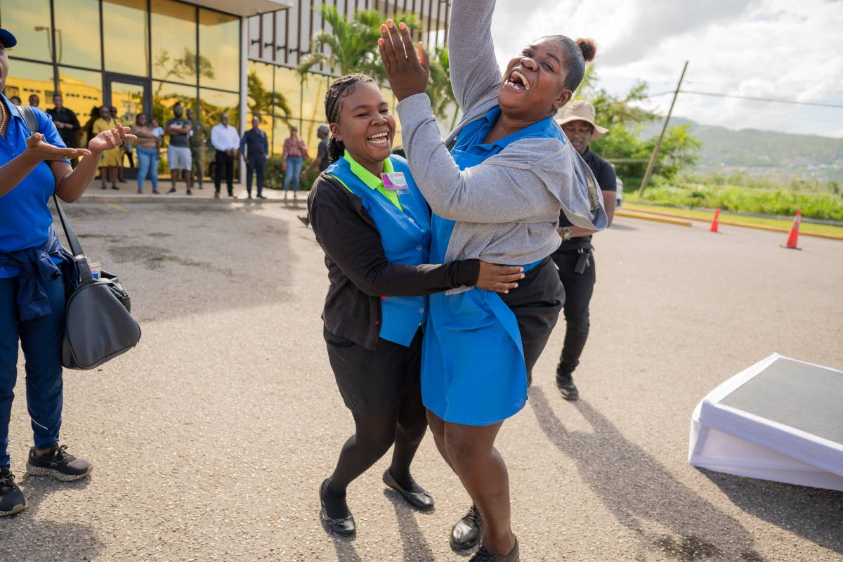 An elated Kemeshia Black celebrates after learning that her wish was granted in NCB Foundation’s Grant a Wish programme. Black received $100,000 towards purchase of furniture.