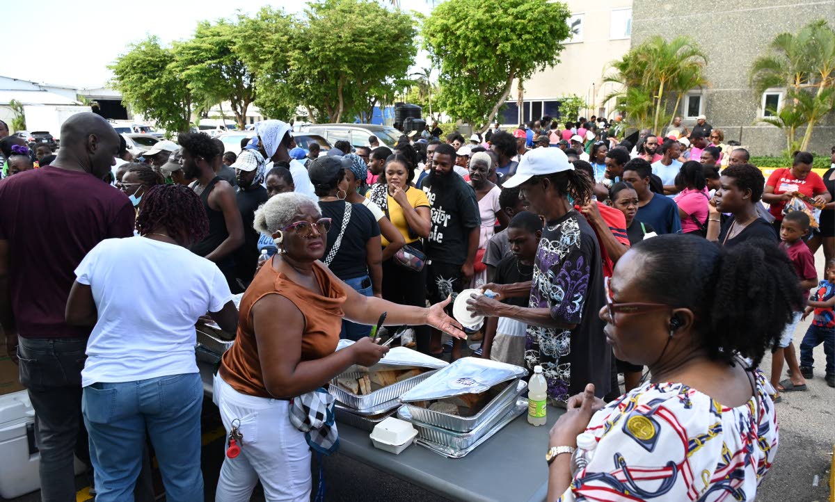Scores of residents of the Catherine Hall and Westgreen communities come out during the Christmas treat.