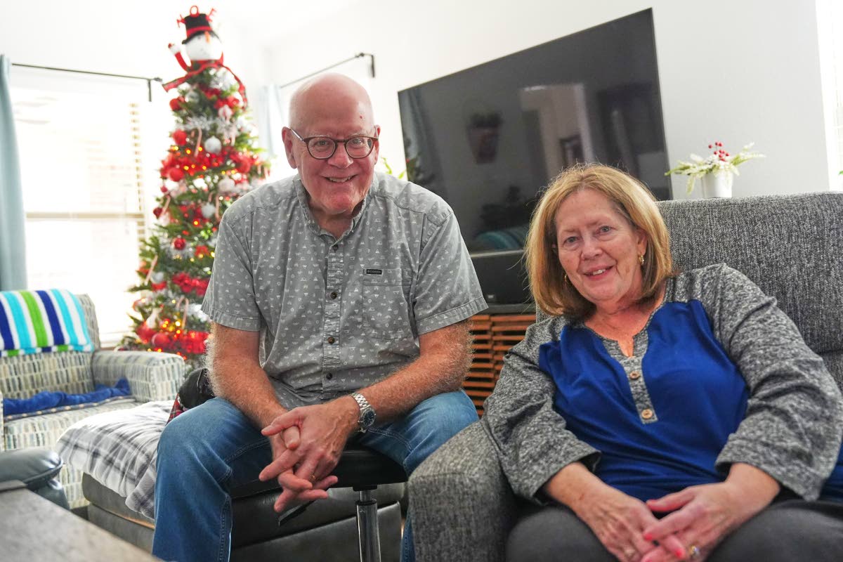 Chuck Dietrick, left, and his wife, Lori Dietrick, sit for a portrait at their home in Anna, Texas, Thursday, December 2025. (AP Photo)