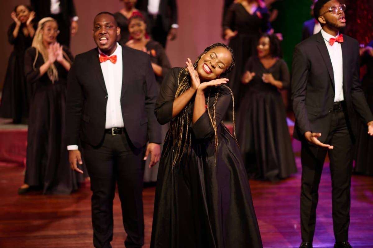 Sherona Forrester-Thomas (centre), founding member, along with tenors Anthony Morgan (left) and Kyle Harvey, engage the audience during the performance of 'A Dexter Christmas' at last year's concert. 