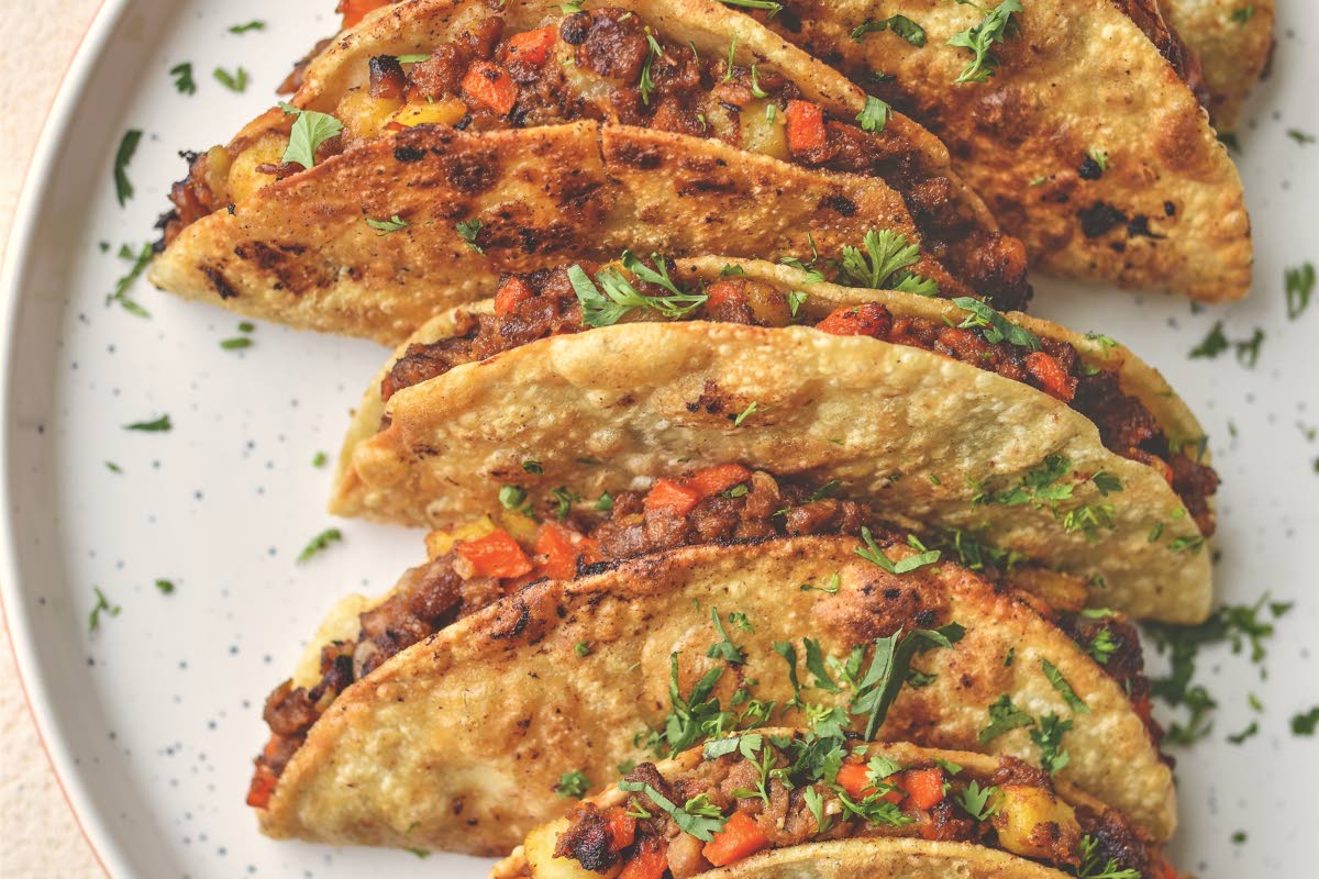 Tacos dorados de picadillo, from the cookbook ‘Plantas: Modern Vegan Recipes for Traditional Mexican Cooking’ by Alexa Soto.