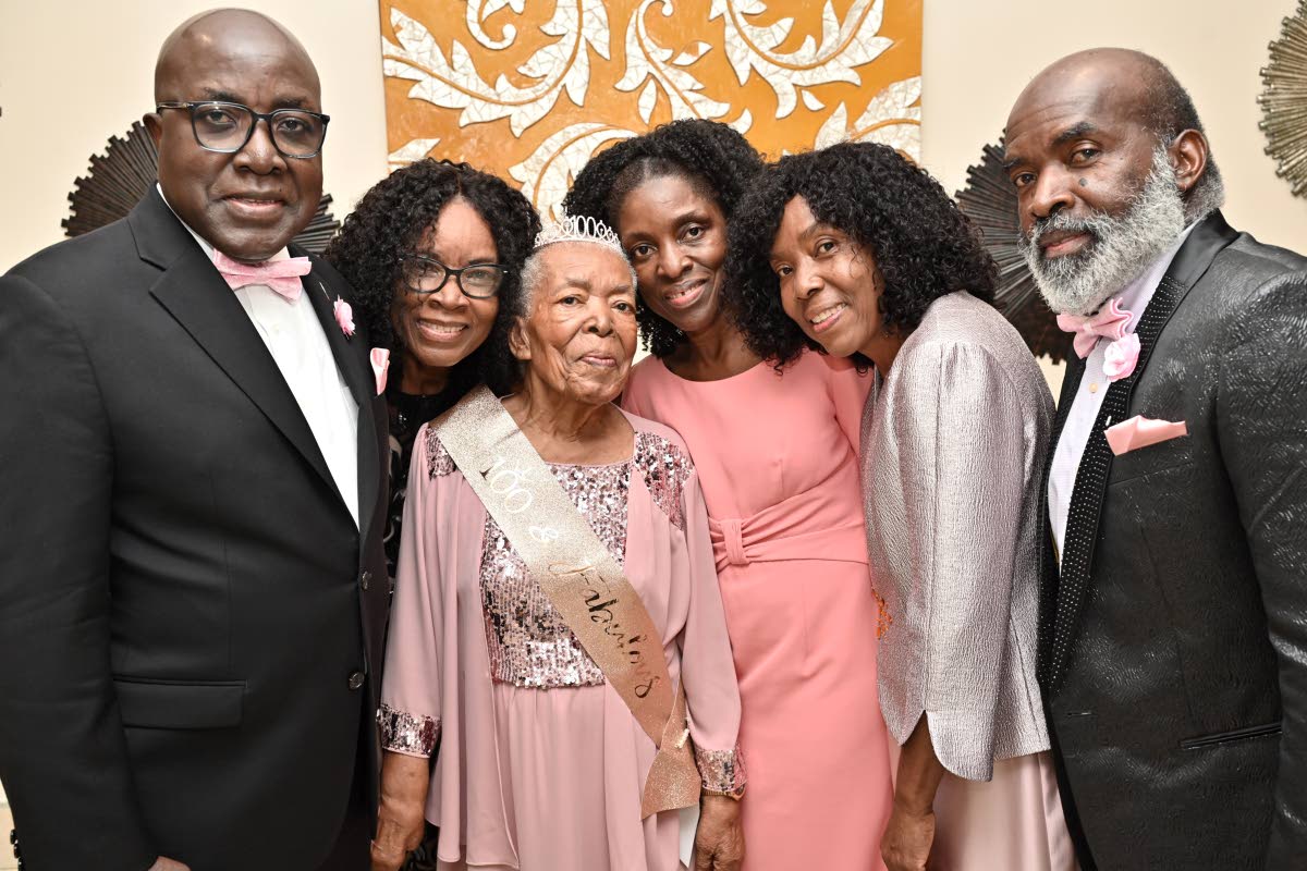 Henrietta A. Williams (third left), popularly known as ‘Miss Heady’, celebrated her 100th birthday with her children (from left) George Williams, Paulette Williams, Janet Williams, Laurice Haye, and Melbourne Williams at her 100th birthday celebration 