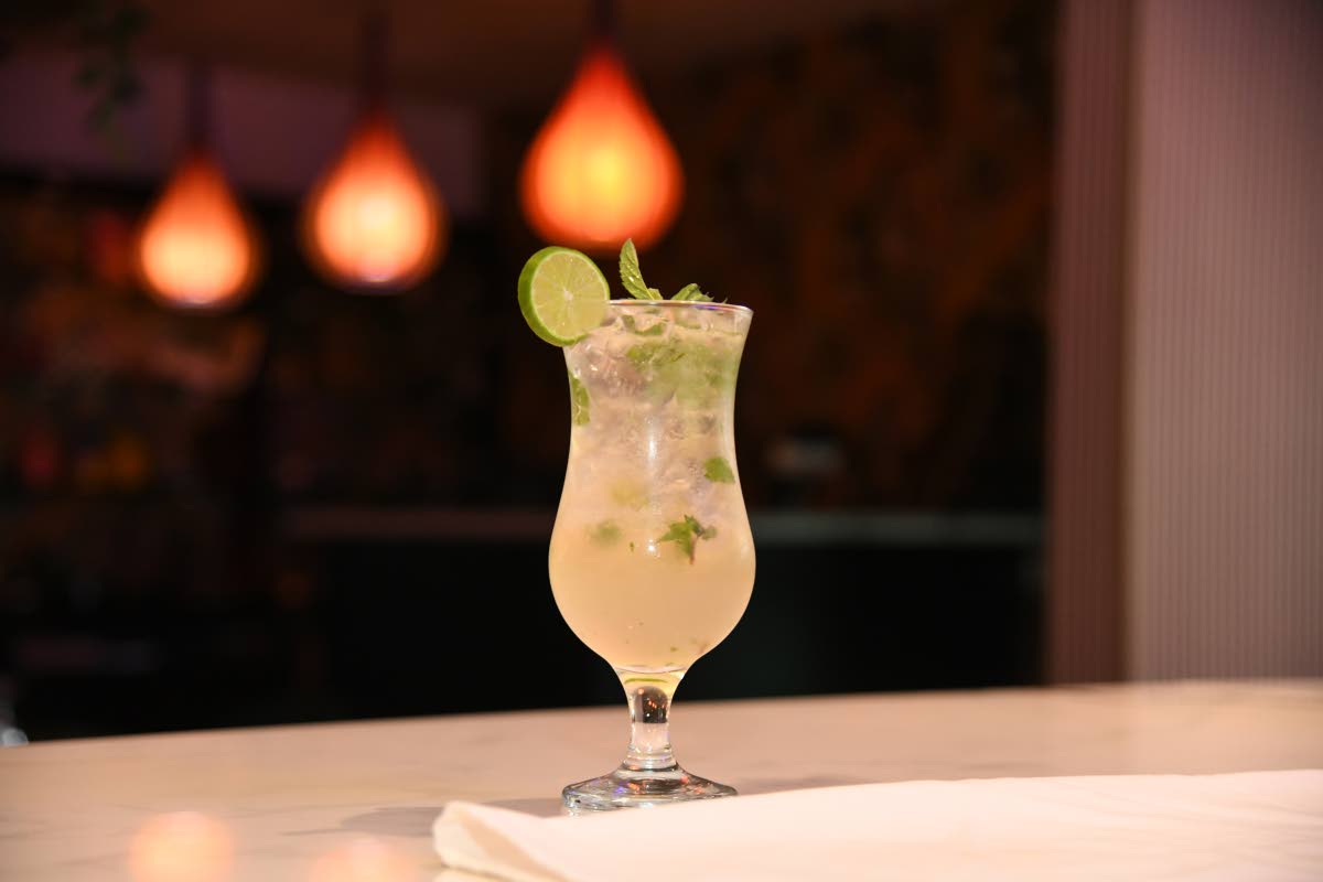 The Worthy Park Swizzle combines ingredients such as mint leaves, lime juice, cane sugar syrup and cocktail bitters, along with the Worthy Park Select.