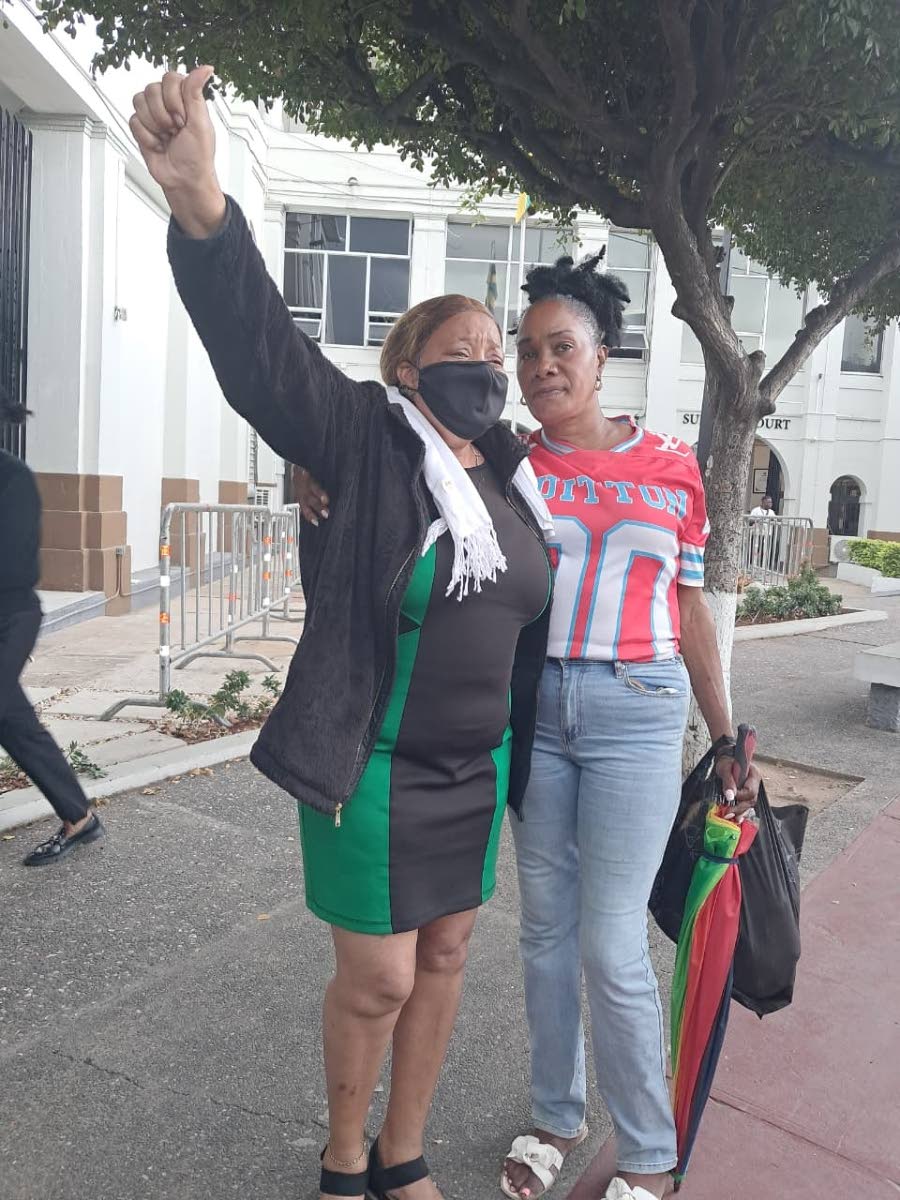 Sophia Lugg (left), mother of Donna-Lee Donaldson, celebrates the guilty verdict with her sister and Donaldson’s aunt, Johana Lugg.
