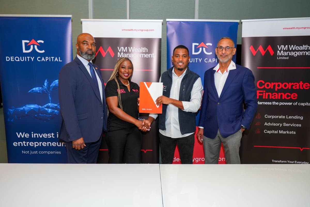 From left: VM Wealth Deputy CEO Brian Frazer; VM Wealth Chief Operating Officer,Allison Mais; Dequity CEO and founder Kadeen Mairs; and Chairman of Dequity Dr Damien King, pose with the new agreement signed between Dequity Capital Management Limited and VM