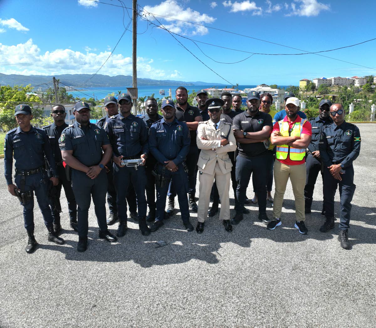 Senior Superintendent of Police Eron Samuels (right), the commanding officer for the St James Police Division, with several members of the Jamaica Constabulary Force at the launch of a three-day drone pilot training programme.