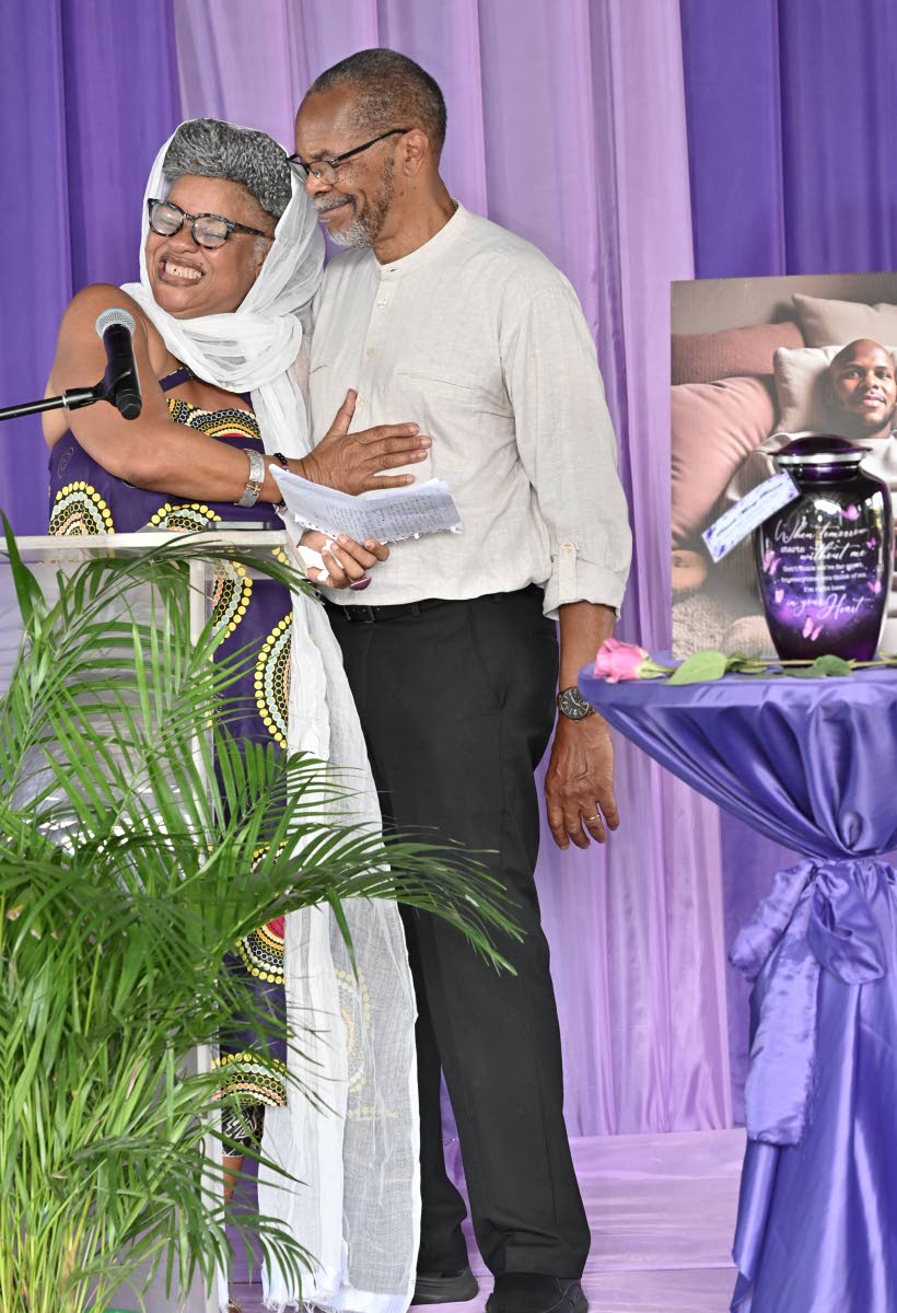Bridgett Anderson and Ricardo Munoz Bennett, parents of Ricardo Anthony Munoz Bennett speaks at the thanksgiving service for their son, Ricardo Anthony Munoz-Bennett, at Louise Bennett Garden Theatre on Hope Road in Kingston on Wednesday.