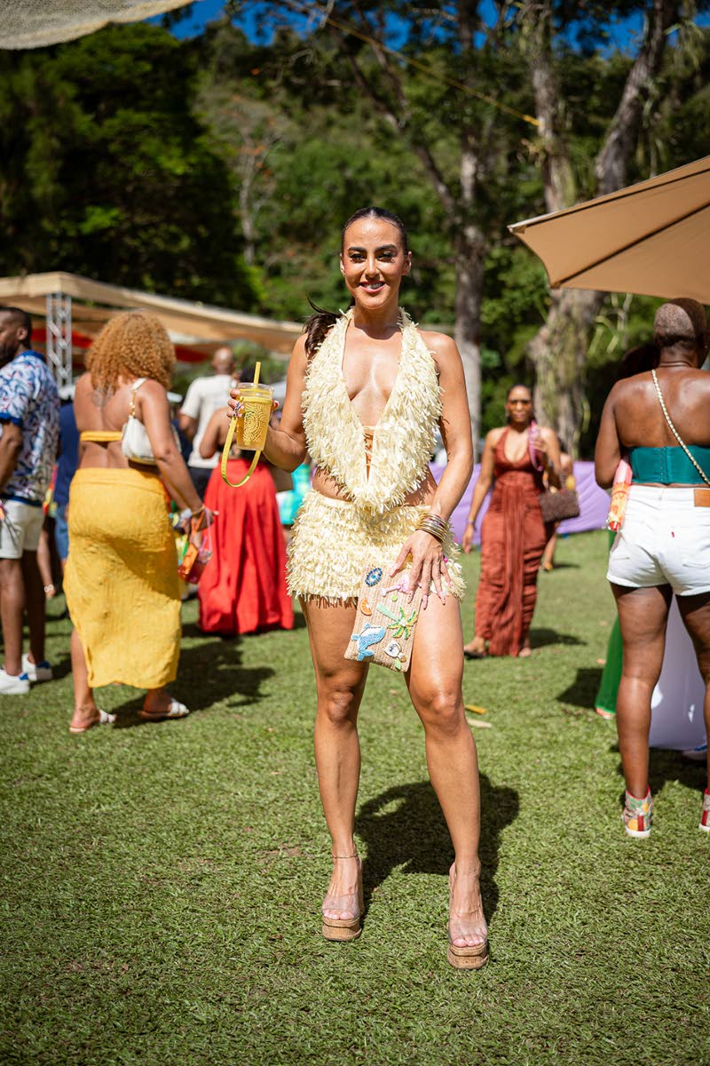 Antiguan hospital finance coordinator Ali John steps out in a textured Sommer & Co ensemble.