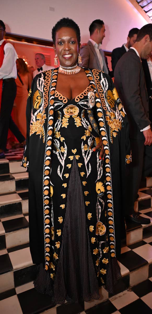 Angella Whitter, managing director of the Whitter Group of Companies, captured attention in a Temperley London gown.