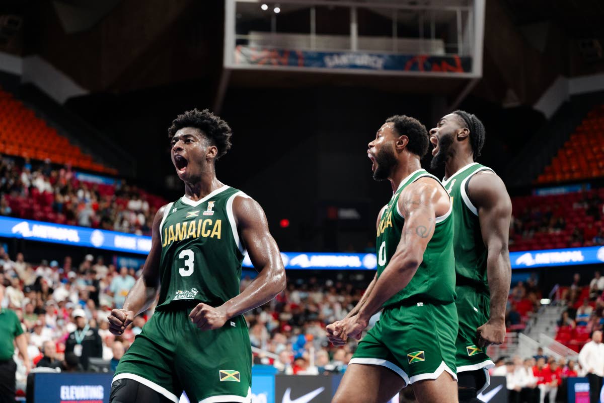 From left: Jamaica’s Chase Audige, Jordan Kellier, and Giovanni Fraser celebrating during a FIBA Basketball World Cup Qualifier against Puerto Rico.  From left: Jamaica’s Chase Audige, Jordan Kellier, and Giovanni Fraser celebrating during a FIBA Baske