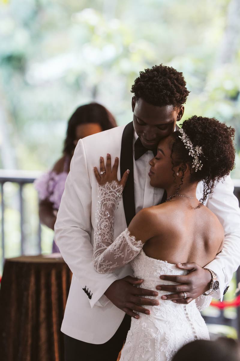 Holding each other close, the newly-weds took centre stage on the dance floor.