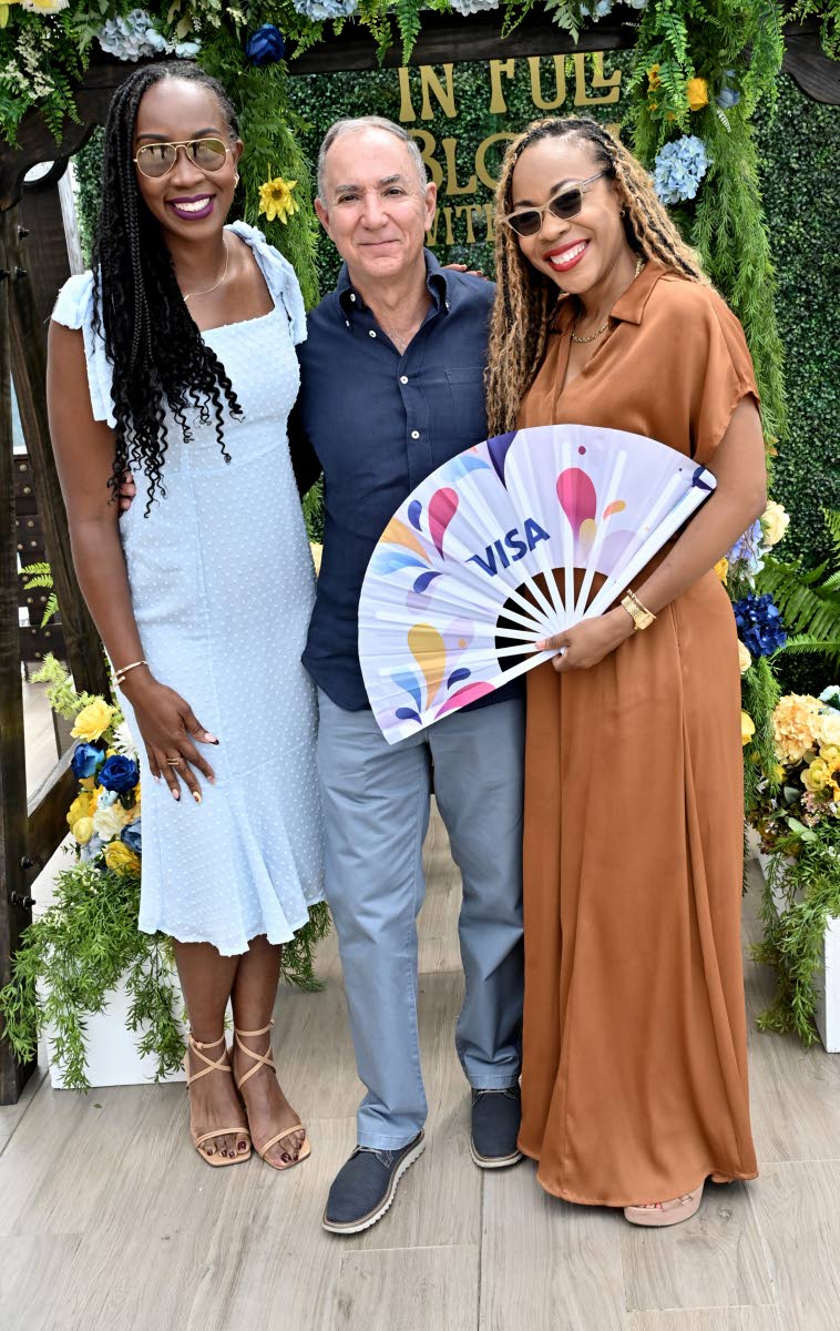 The Visa team is out and ready to unwind, spotted are (from left) Ayanna McClean, regional marketing manager; Frank Gandarilas, country manager for English and Dutch Caribbean countries; and Kenesha Thomas, senior marketing manager.