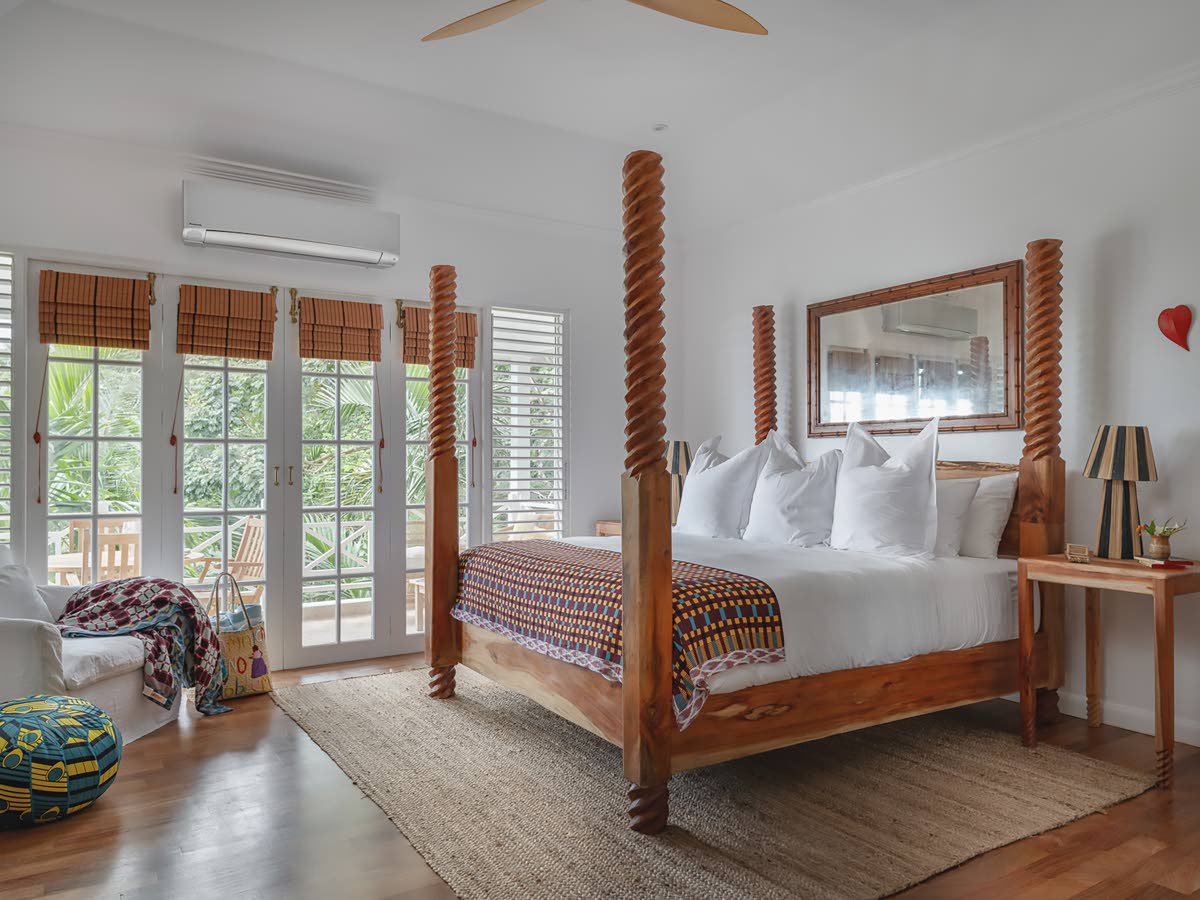 One of six delightful bedrooms with a private balcony.