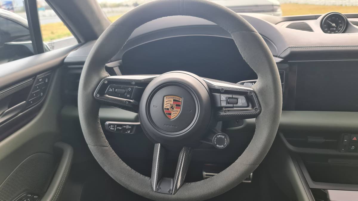 The driver’s perspective is anchored by the GT sports steering wheel, which provides direct access to the drive mode dial, allowing for an instant transition between a comfortable city cruise and a full-performance launch.