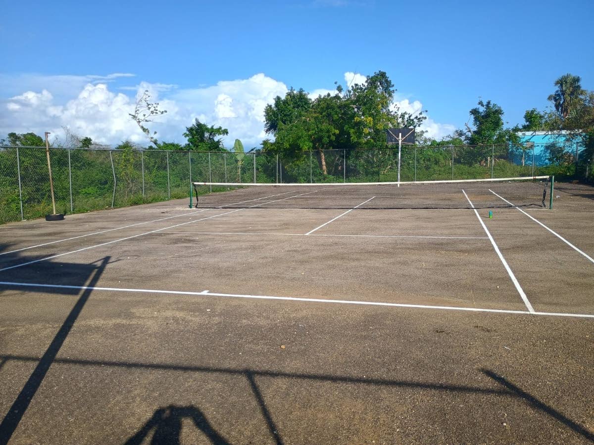The freshly lined tennis court at Broughton Primary School, now ready to introduce students to the sport and hours of physical activity.
