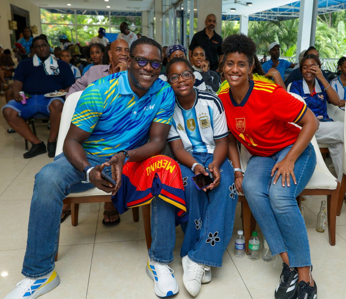 Enjoying a family moment are Stephen Price, head of Flow, his daughter Marley, and wife, Imani Duncan-Price.