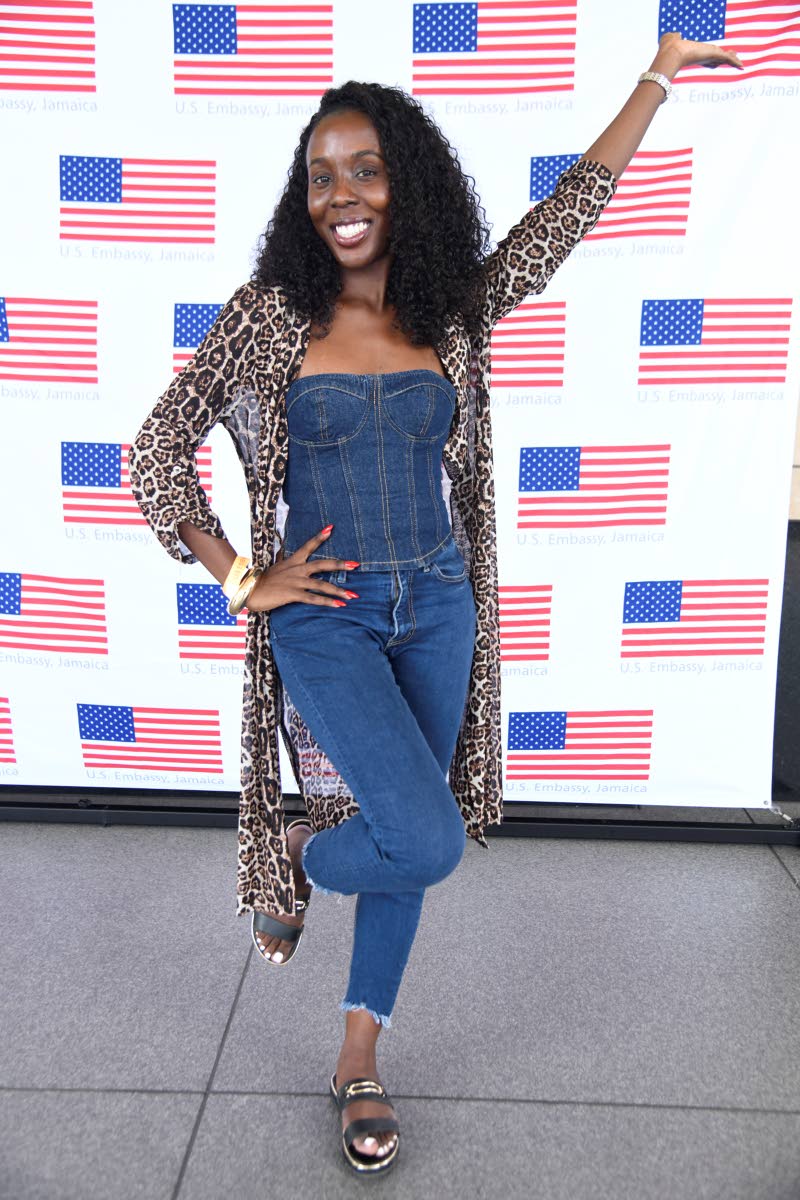 A’vrielle Douglas-Campbell, media practitioner, styles denim with a bold animal-print cover-up.