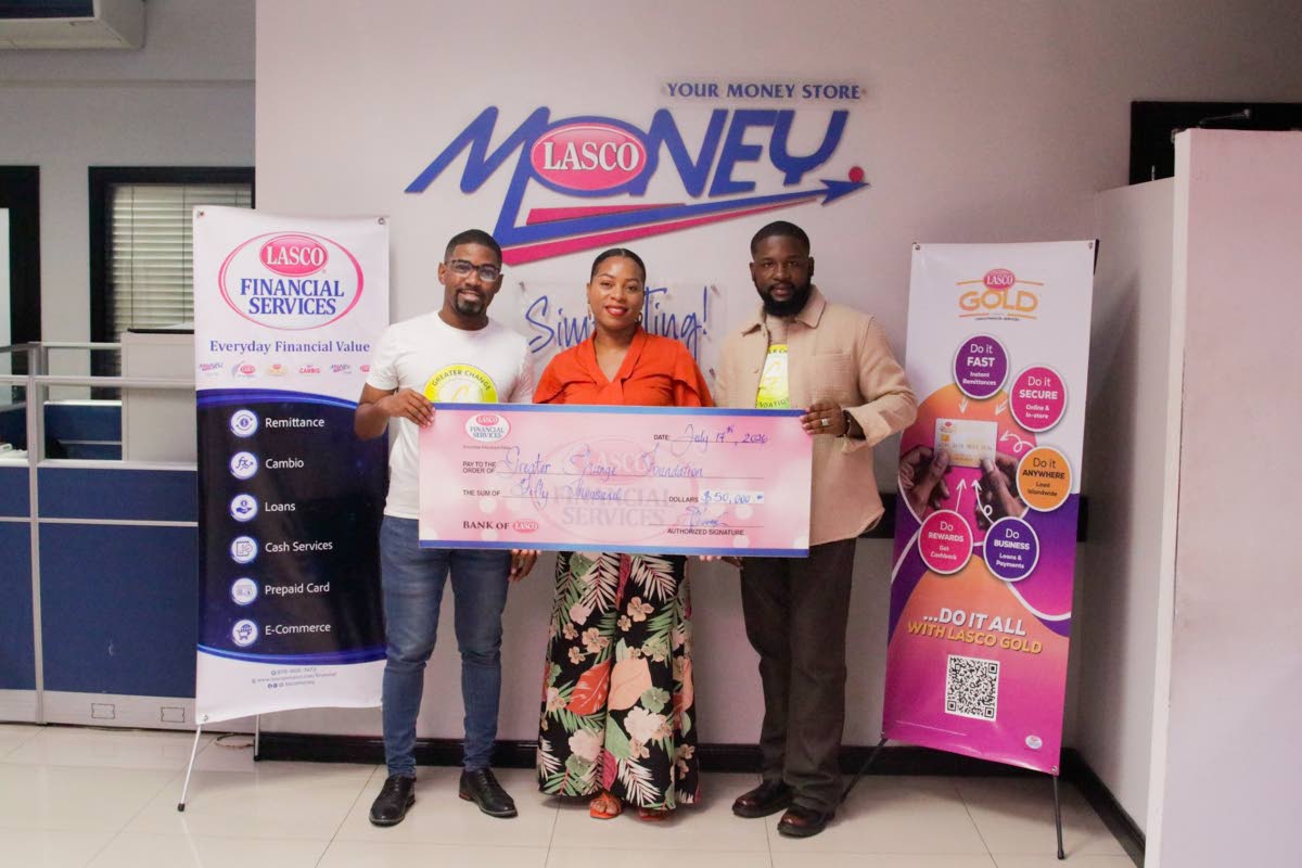Samantha Fuller-Maragh, brand manager – card services at LASCO Financial Services, presents the $50,000 cheque to Greater Change Foundation’s Board Chairman Warren Bernard (left) and Director of People and Culture, Donrick Dixon on Friday at the LASCO 