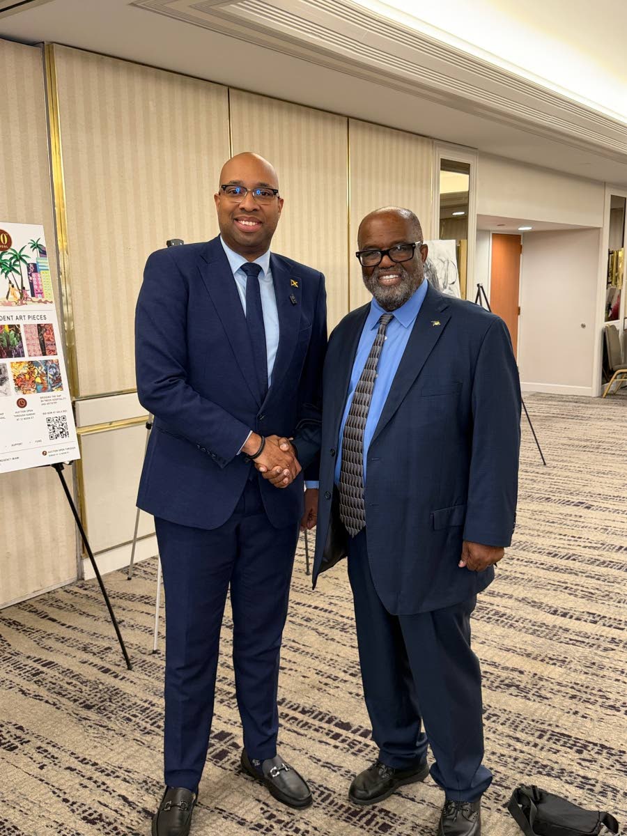 Delano Seiveright, Jamaica’s minister of state in the Ministry of Industry, Investment and Commerce, and Dr Andy Ingraham, founder, president and chief executive officer of the National Association of Black Hotel Owners, Operators and Developers, during 