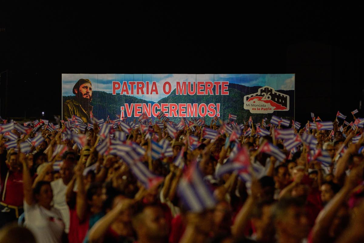 A billboard depicting the late leader Fidel Castro and reading ‘Homeland or death, we will defeat!’ in Pinar del Rio, Cuba.