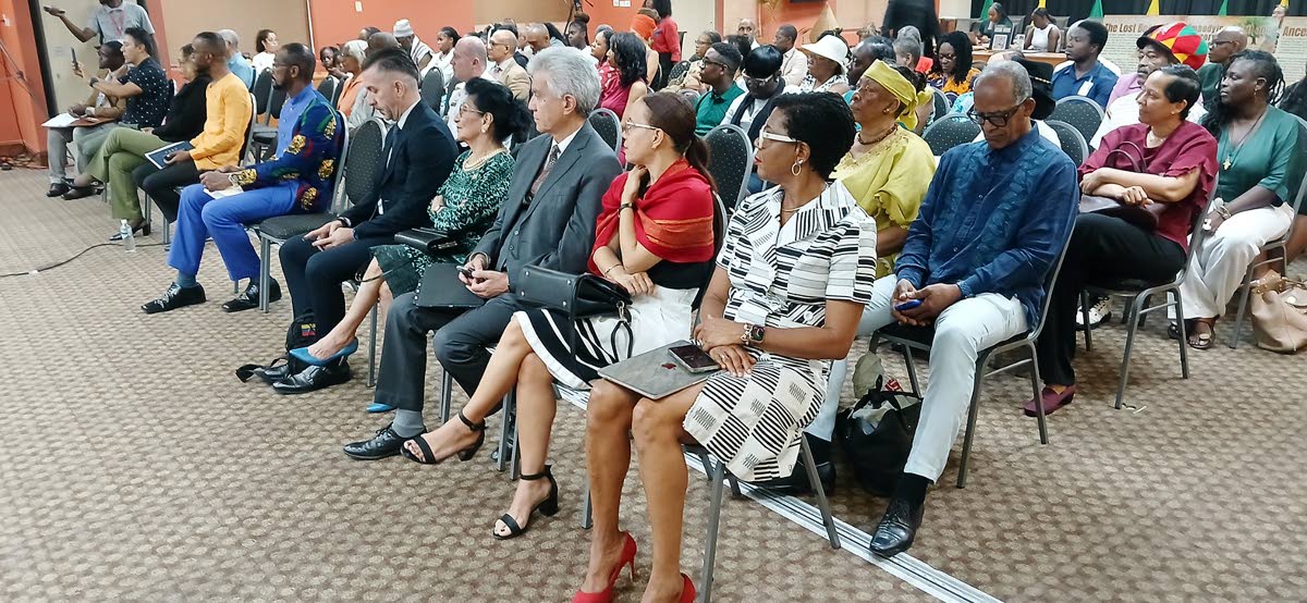 Participants listen during the Caribbean Continuity Conference at The University of the West Indies Regional Headquarters in St Andrew.