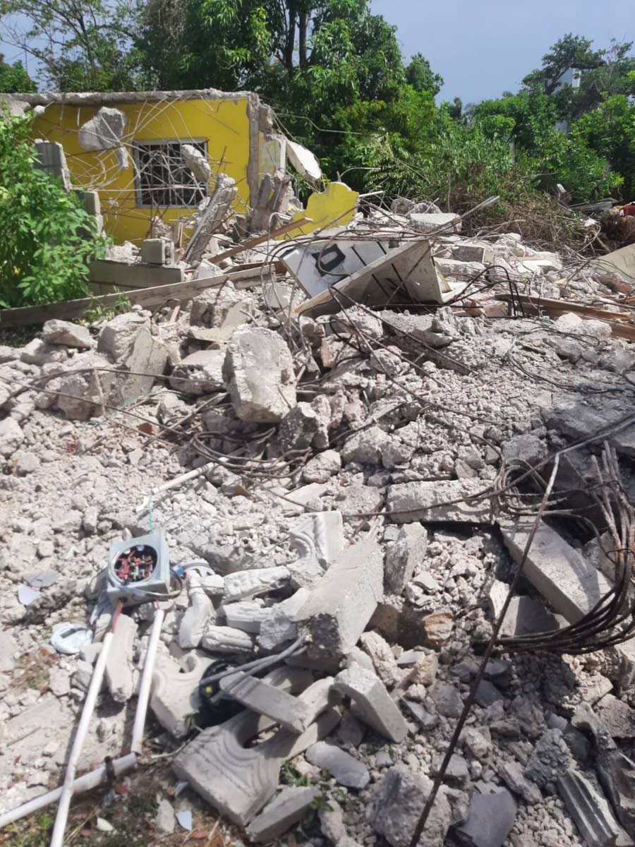 Signs of the demolition exercise in Cooper’s Pen, Trelawny, on Tuesday.
