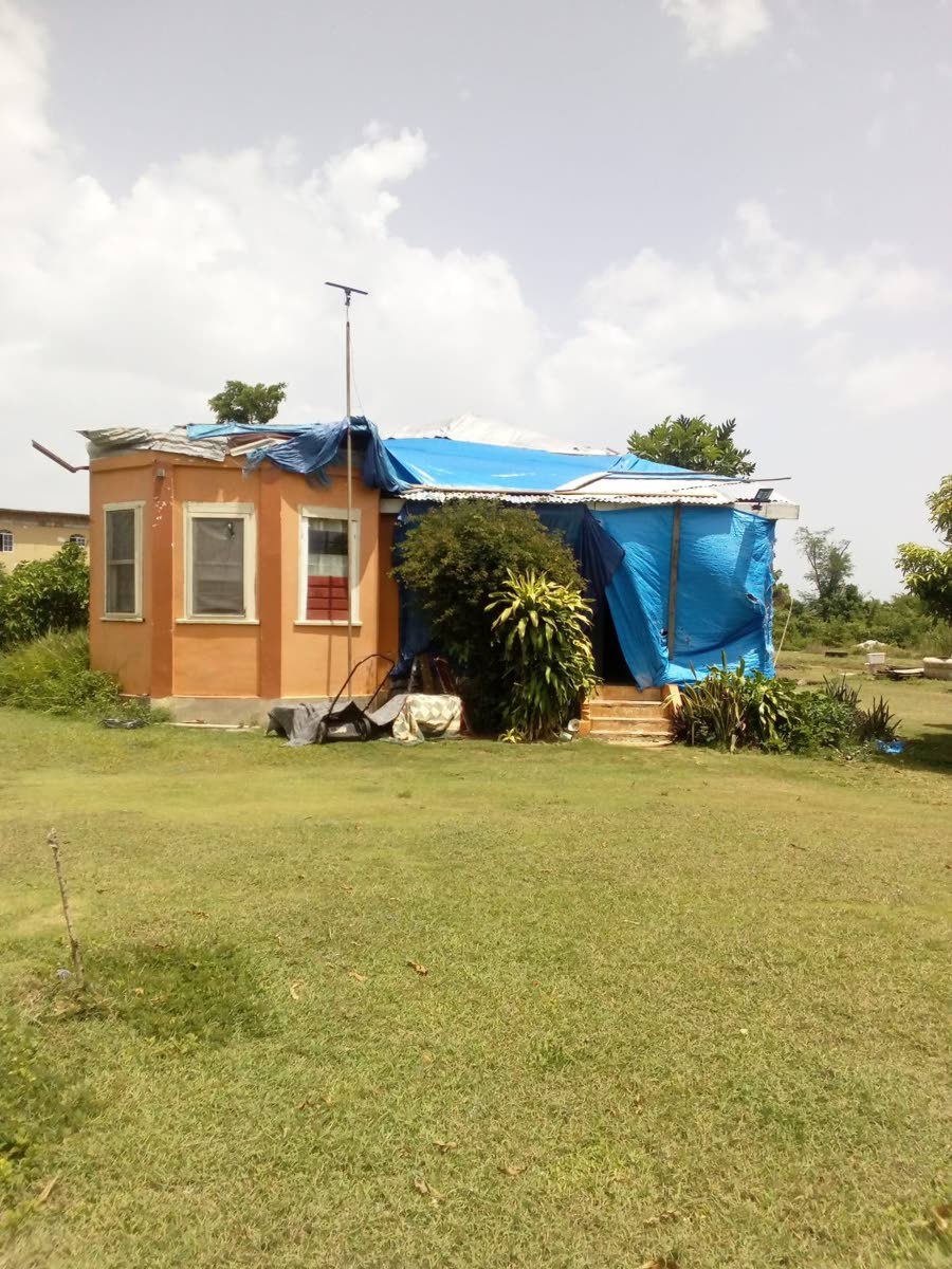 The house on the property lost its roof to Hurricane Melissa.