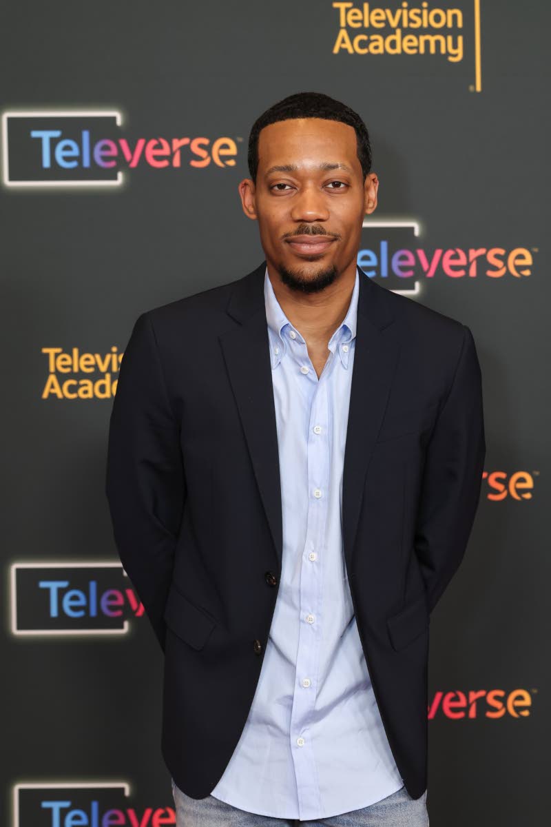 Taking a solo shot at the Televerse arrivals is Abbott castmate Tyler James Williams.