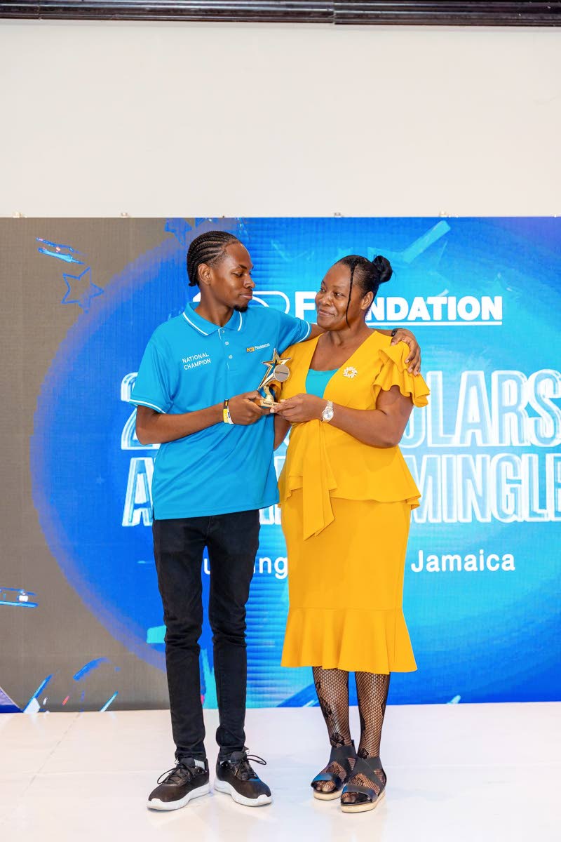 Ryan Ewan shares a proud moment with his mother, Kereta Phillips. 