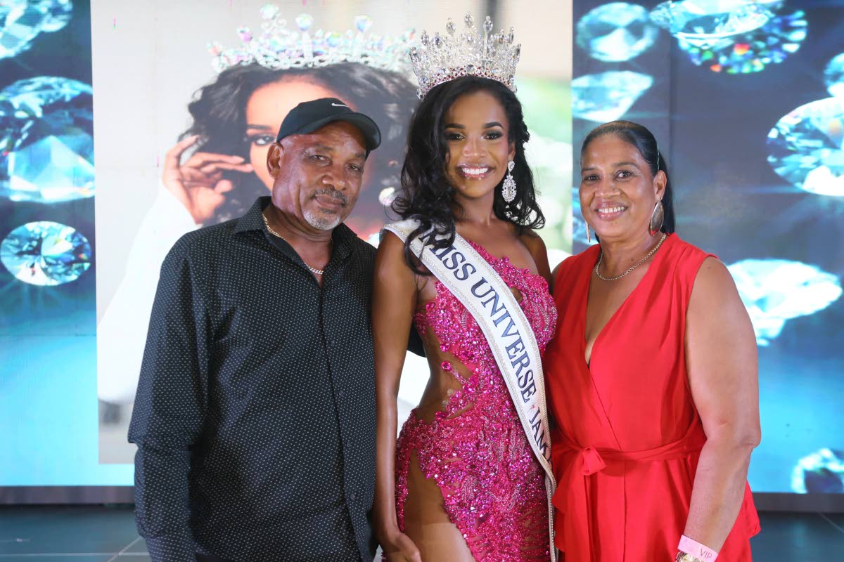 Proud parents Victor and Sonia Hall join their daughter, Celene, following her crowning as Miss Universe Jamaica 2026 at AC Hotel Kingston on Sunday. 