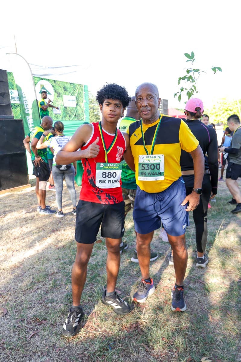 Jonathan Leiba (left) shares a proud post-race moment with his grandfather, John Leiba.