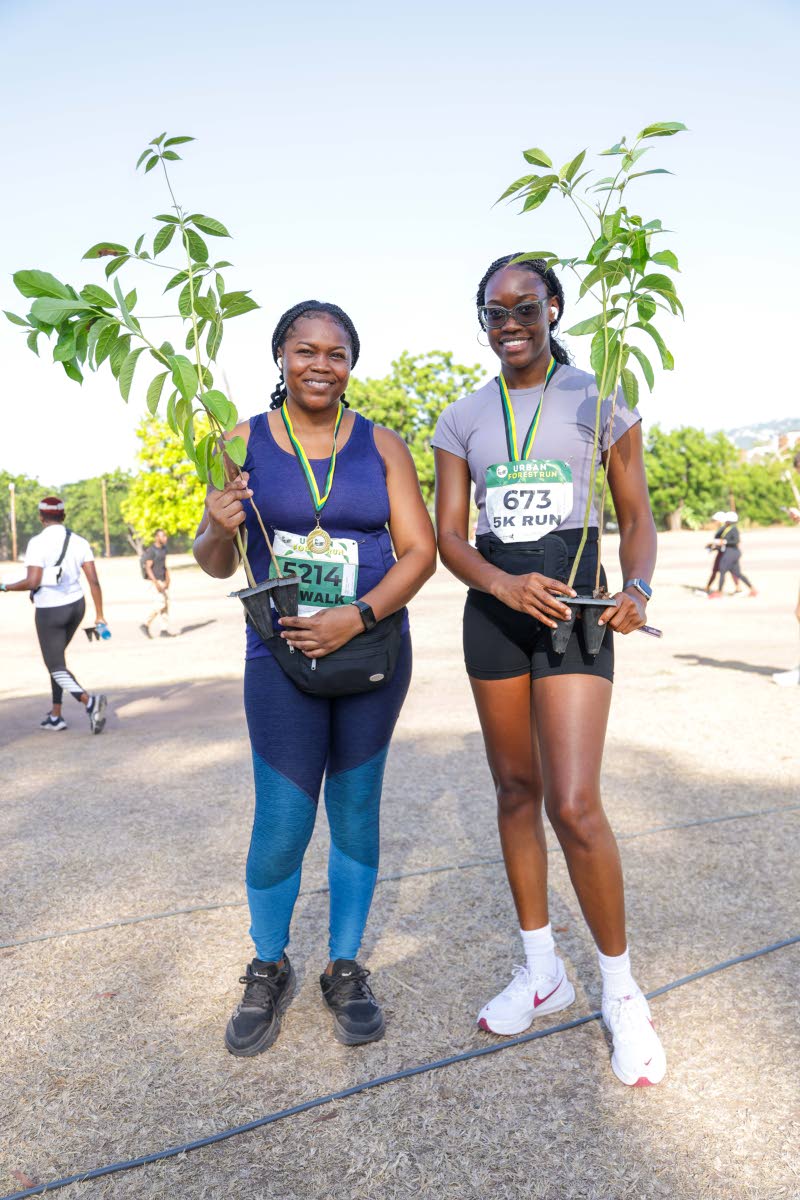 Medals, seedlings and bright smiles mark the finish for Peter-Gaye Laylor (left) and Shantal Lyttle.