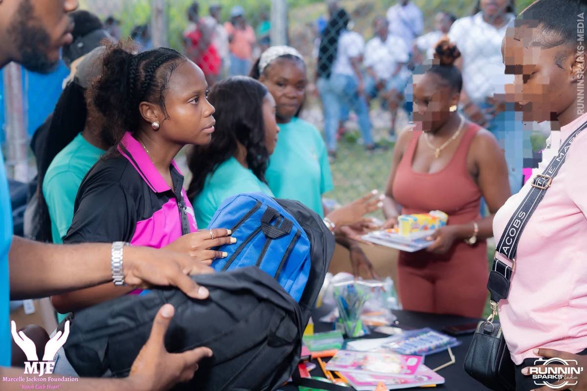 Marcelle’ Jackson (left) working at one of her foundation’s events. 